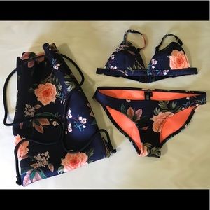 triangl swimsuit and bag